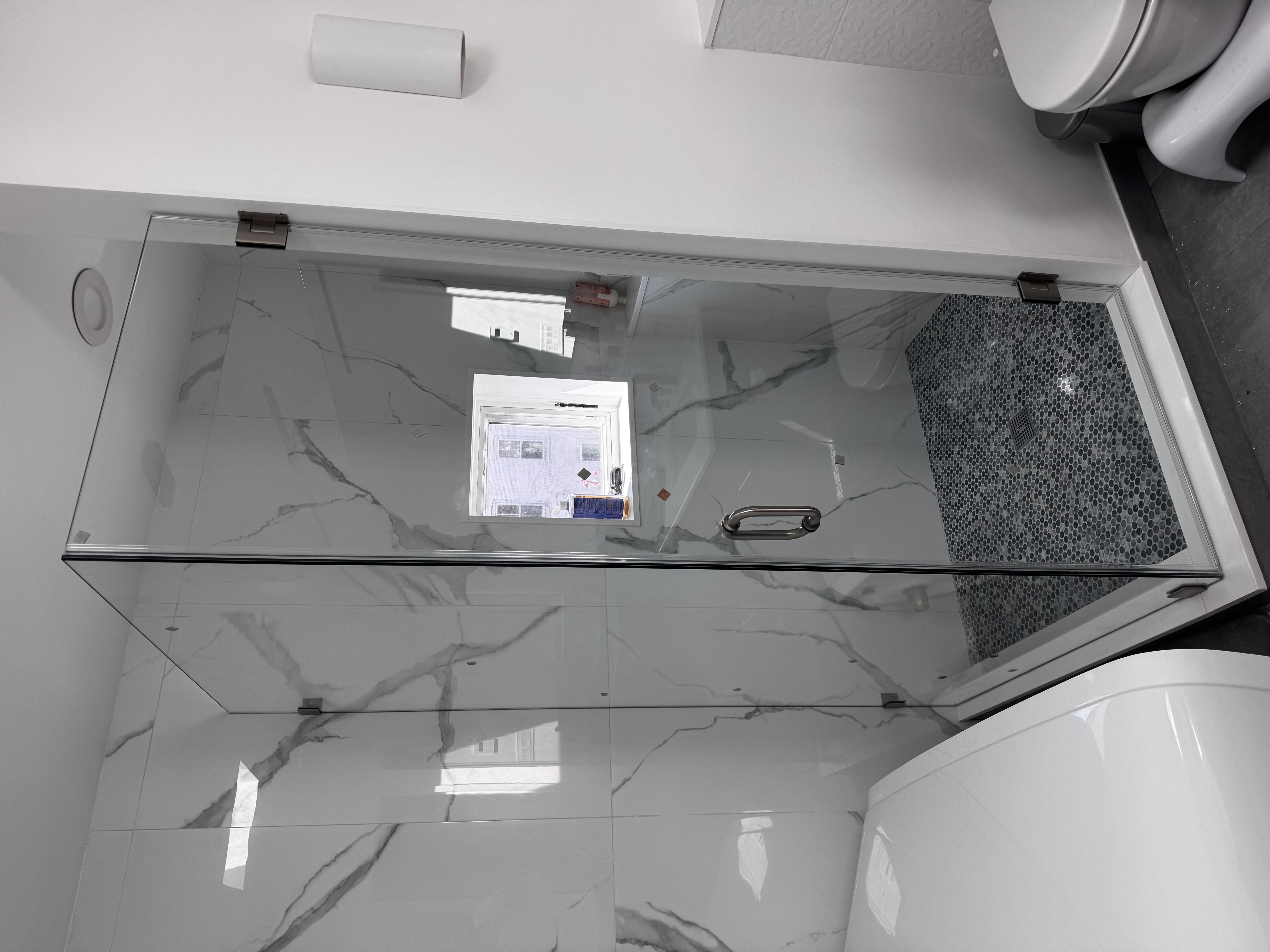 Corner Swing Door shower door installation in Williamsburg Brooklyn